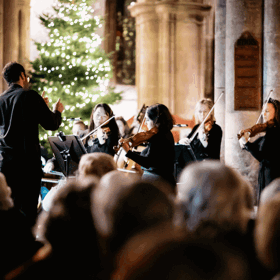 Royal Northern Sinfonia Christmas by Candlelight with a Christmas tree
