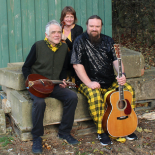 Three musicians holding instruments