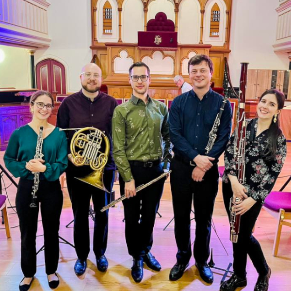 Sirocco Winds, five musicians holding wind instruments 