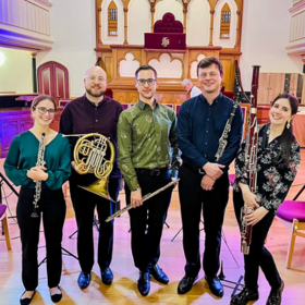 Sirocco Winds, five musicians holding wind instruments 